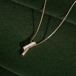 S925 sterling silver gold geometric necklace with sparkling zircon on green velvet