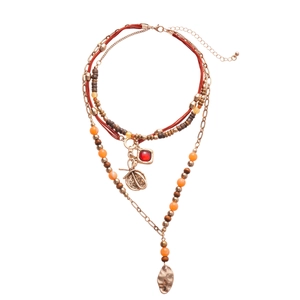 Bohemian multi-layer necklace with wooden beads and vintage metallic leaf pendants