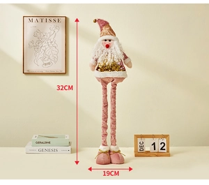 Detail of pink sequin Santa doll with telescopic legs and plush fabric for holiday decor