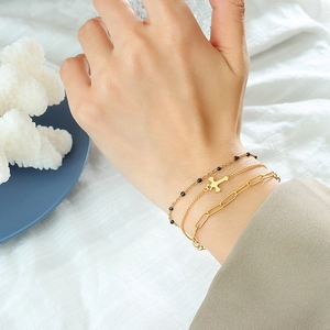 Three-layer gold titanium steel bracelet set with cross pendant and black beads for women