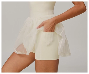Macro detail of breathable tennis skirt with functional side pocket for mobile phones