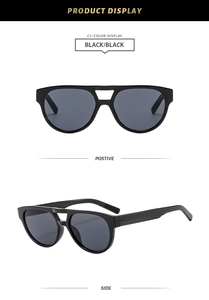 Front and side views of classic black double-bridge sunglasses with dark tinted lenses