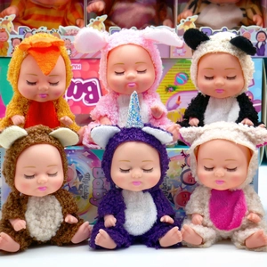 Close-up of six 5-inch sleeping baby dolls in cute animal onesies like rabbit and panda