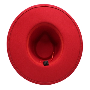 Detail of red wool felt fedora showing inner 65% cotton label and adjustable drawstring
