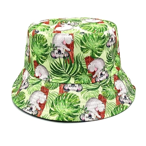 Green reversible bucket hat with tropical koala print for summer outdoor sun protection