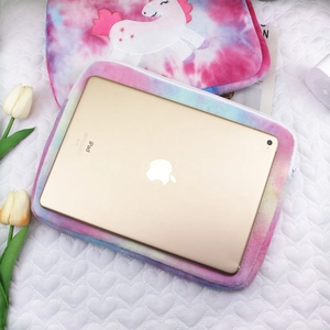 Detail view of unicorn embroidery on tie-dye plush 11-inch iPad sleeve with top zipper