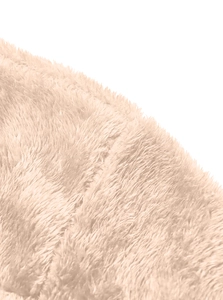 Close-up detail of soft polar fleece fabric in pale pink showing plush texture and warmth