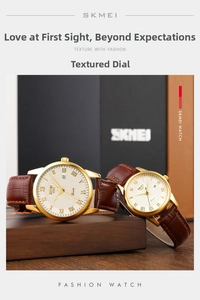 Detailed close-up of brown leather strap quartz watch with Roman numeral dial and date