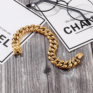Close-up of a bold 18k gold plated Cuban link bracelet for men with polished finish