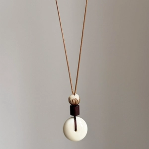 Collier avec pendentif Bodhi de style ethnique, perles en bois et fleur de lotus