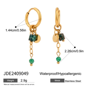 Detail showing natural green stone pendant with golden hammered texture and dimensions
