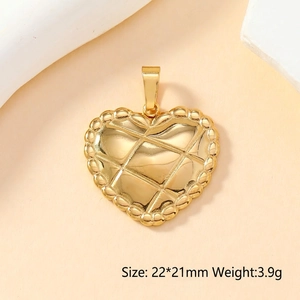 Quilted heart pendant in gold finish showing 22x21mm dimensions and metal texture