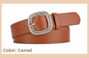 Close-up of camel brown leather belt featuring a square buckle with sparkling rhinestones