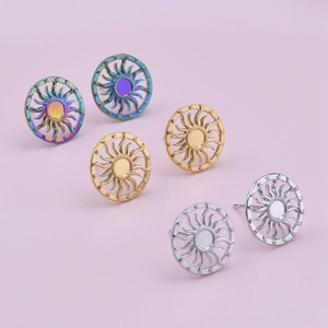 Detailed view of three pairs of sunburst stud earrings in rainbow, gold, and silver finishes