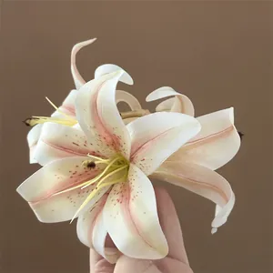 Close-up of realistic lily hair claw with creamy petals and delicate pink details