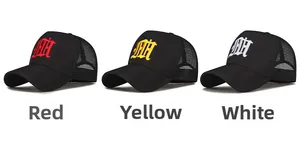 Detailed view of three mesh trucker hats with gothic letter embroidery in red, yellow and white