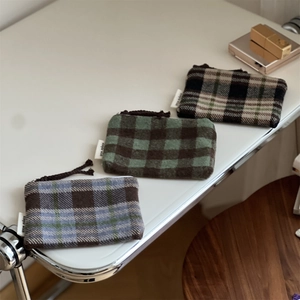 Detailed trio of plaid wool coin purses in blue and green with simple wish woven labels
