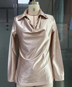 Detailed view of the champagne satin blouse featuring a graceful cowl neck design and metallic sheen
