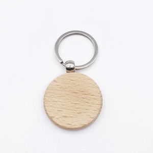 Minimalist DIY round beech wood keychain with natural grain and metal ring on white background
