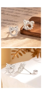Detailed view of silver bow zircon earrings with secure threaded screw-back closures