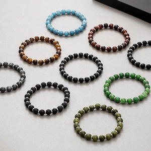 Multiple 8mm natural stone beaded bracelets with tiger eye and stainless steel spacers