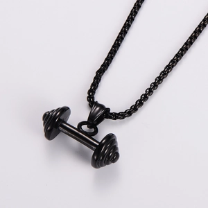 Detail of a matte black dumbbell pendant with a matching box chain for fitness fans