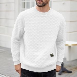 Men's slim fit white long sleeve waffle knit shirt with checkered texture in city setting