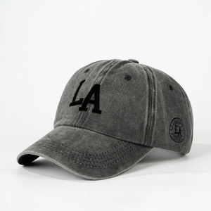 Detailed view of dark grey washed baseball cap with LA embroidery and side patch