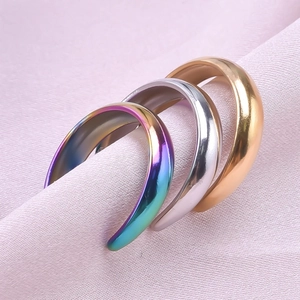 Three minimalist adjustable 304 stainless steel rings in rainbow, gold, and silver finishes