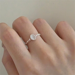 Minimalist S925 sterling silver chain ring with a polished white crystal oval gemstone