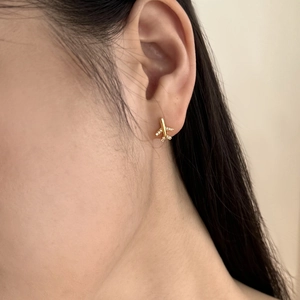 Exquisite gold airplane stud earrings for women with inlaid sparkling cubic zirconia