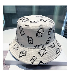 Detail of white bucket hat with black dollar sign print on durable twill cotton fabric