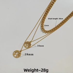 Detail of layered gold necklaces with world map and tree of life pendants, 38cm chain