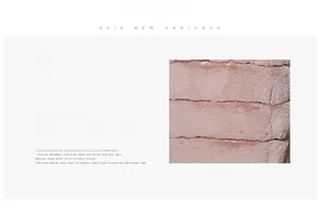 Close-up of pink faux fur winter coat showing thick plush texture and striped pattern