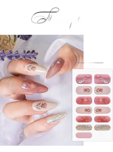 Detail of pink floral nail stickers with glitter and rhinestones model YS-009 on hands