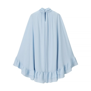 Detail view of light blue chiffon top with back button closure and elegant ruffle hem