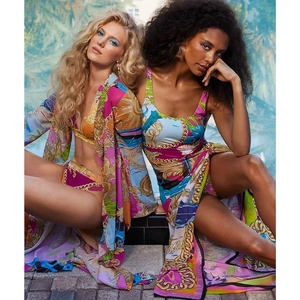 Baroque print swimwear set featuring a bikini with cardigan and one-piece with sarong