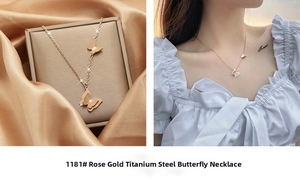 Rose gold butterfly pendant necklace shown on elegant silk and worn on a neck