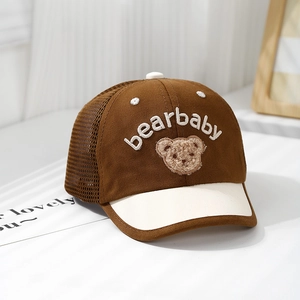 Close-up of baby baseball cap with 3D teddy bear embroidery and breathable mesh