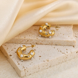 Elegant 18K gold plated C-shaped earrings with pearls and zircon on stone and silk