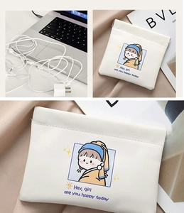 Detail of mini portable makeup pouch with cartoon girl print for storing earphones