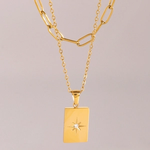 Double layered gold stainless steel necklace with square star pendant and clear gemstone