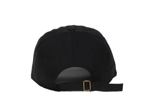 Detail view of adjustable strap and metal buckle on black cotton sports baseball cap