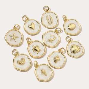 Golden ocean themed charms set featuring starfish, shells and turtle for DIY jewelry making