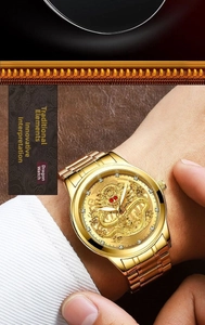 Macro view of gold dragon relief dial with sparkling diamond hour markers on a men's watch