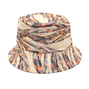 Close-up of bucket hat fabric featuring colorful abstract lines and leopard print details