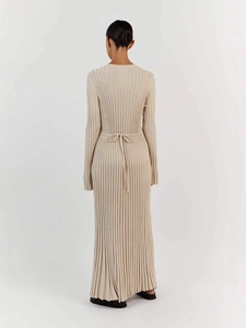 Elegant beige ribbed knit long sleeve maxi dress with back tie detail in a minimal style