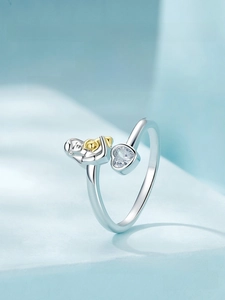 Detail of S925 sterling silver ring showing mother and child relief and heart zircon