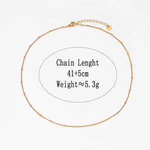 Detail of golden bead chain necklace showing 41+5cm length and 5.3g weight parameters
