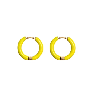 Close-up of bright yellow enamel hoops with 18K vacuum plating on stainless steel